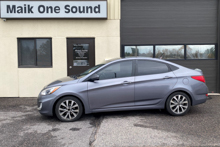 2017 Hyundai Accent with professional window tint in North Bay